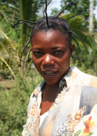 An African girl on a tropical background